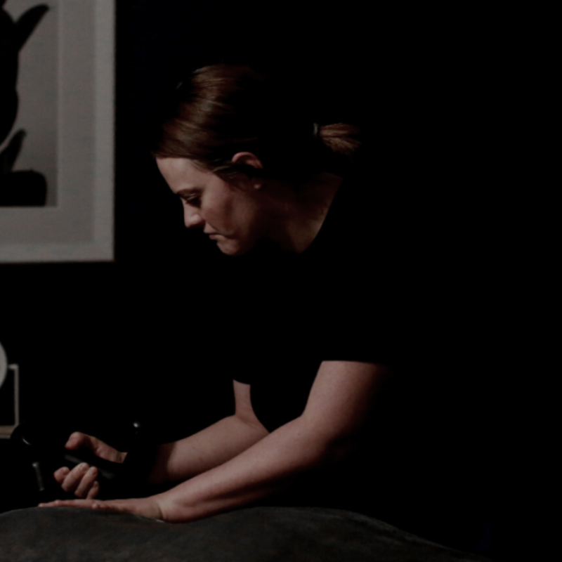 Jasmine Radi working at Vitality Massage Studio.